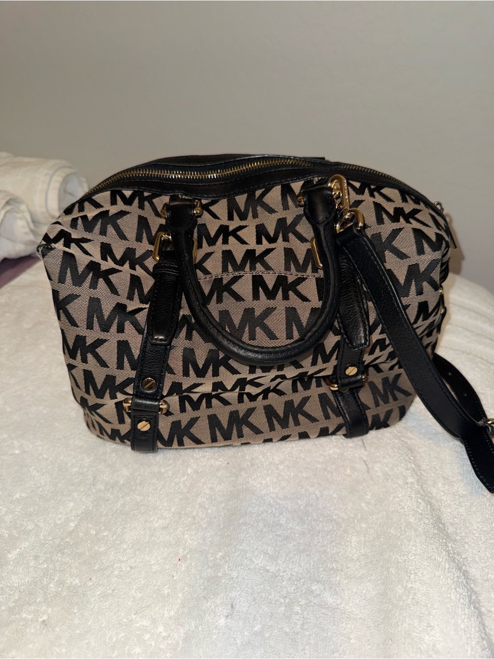 Michael Kors black duffle signature bag